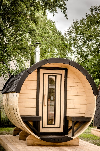 Viking Industrier 1.9m x 3m Sauna Barrel (SS193001) natural wood colour with black shingle roof.