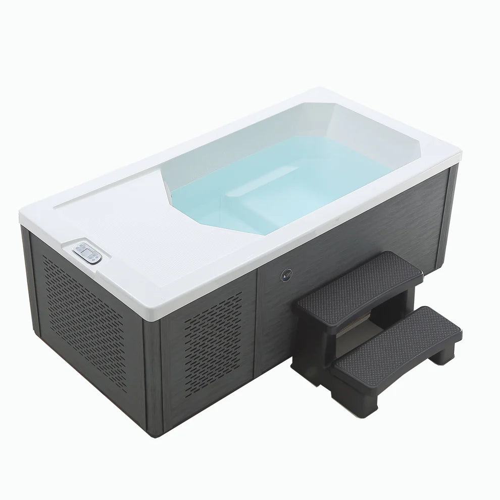 Great Lakes Chill Tub in Slate Grey with clear water filled showing steps.