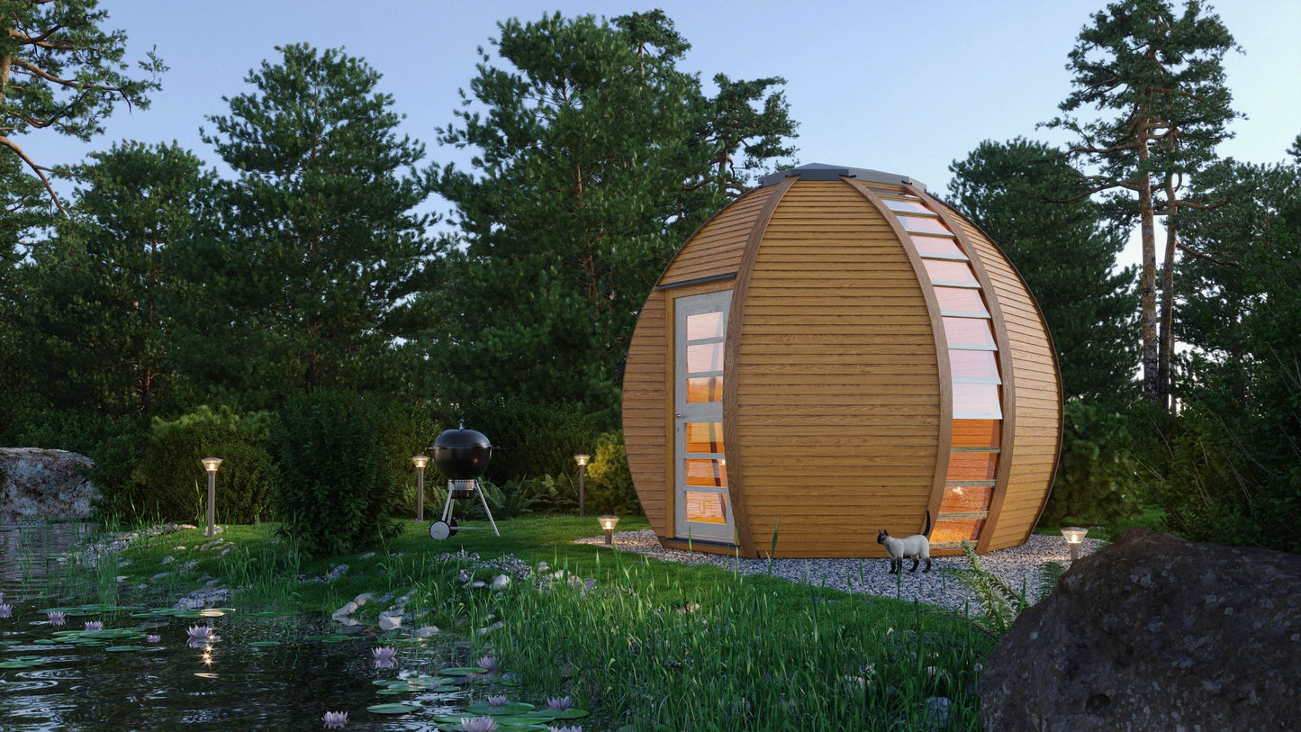 Brown Elegant Garden Room by Huuden set in green garden area next to a garden pond at dusk. 