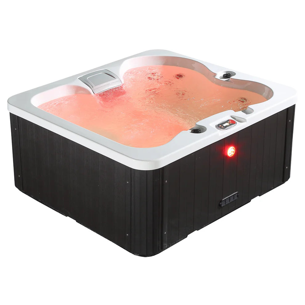 Manitoba jet spa filled and showing orange coloured LED lights in the water. 