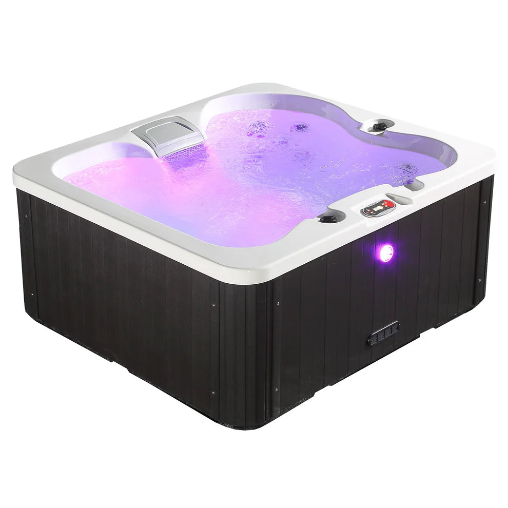 Manitoba Canadian Spa Company Hot Tub filled with purple LED lights on display.