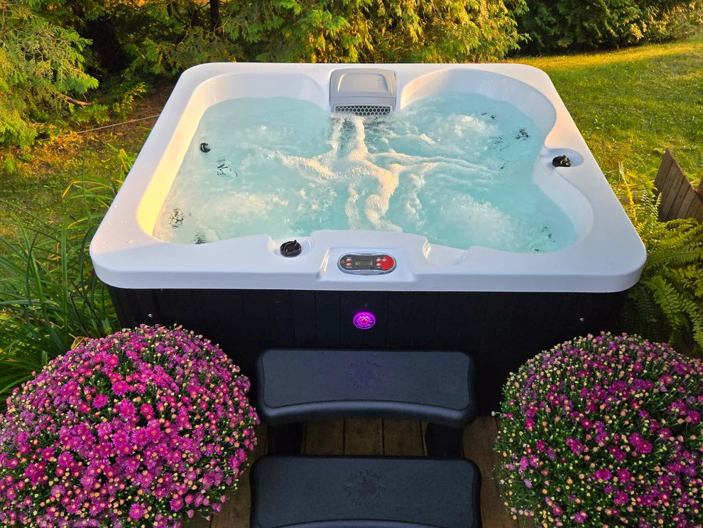 Manitoba Jet Tub by Canadian Spa company showing bubble jets with clear water. 