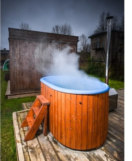 Viking Industrier Ofuro Hot Tub with steam coming from top and external heater on show. 